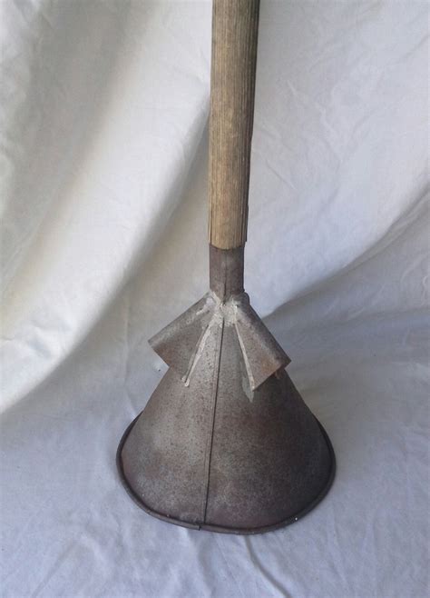 ILL Measures approximately 42 12" high by 8" wide at base. . Antique laundry plunger